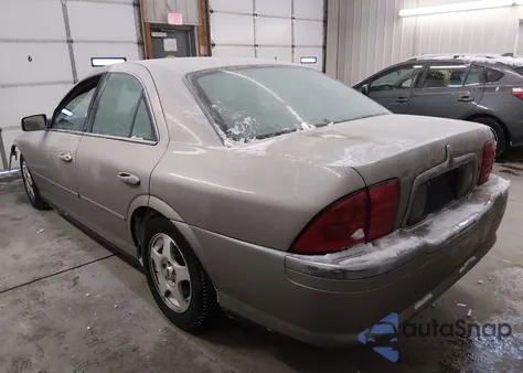 2000 Lincoln Ls V8 Auto z USA, uszkodzony, nr VIN 1LNHM87A8YY879809